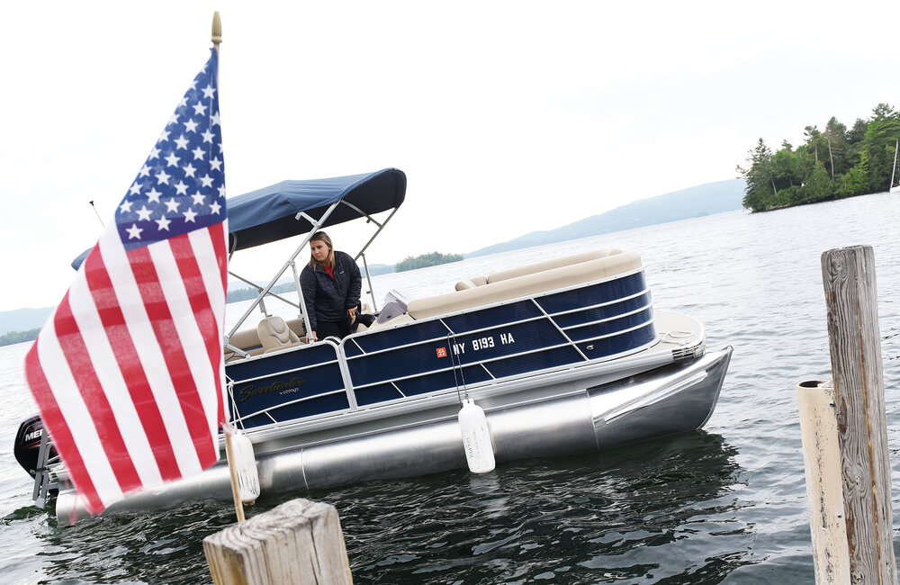 ERICA MILLER/GAZETTE PHOTOGRAPHER  
Supervisor Lindsey Ziegler, of Queensbury, docks a boat ready for renters at Little Harbor Boat Rental, at Beckley’s, owned by Andrew Brodie of Yankee Boating Center (and Broadie’s Lakeside and Yankee Marina) in Diamond Point on Saturday, June 2, 2019.