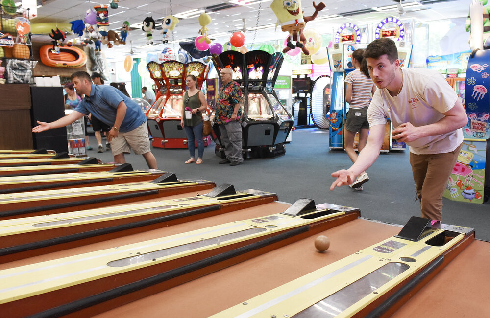 ERICA MILLER/GAZETTE PHOTOGRAPHER  
Will Janos, of Queensbury, plays a game of skeeball at Playland Arcade on Canada Street in the Village of Lake George in Lake George on Sunday, June 9, 2019.