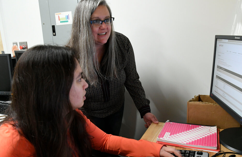 PETER R. BARBER/STAFF PHOTOGRAPHER Union College professor Heather Watson looks over computer screens with graduate student Elise Liebon Wednesday, February 12, 2020.